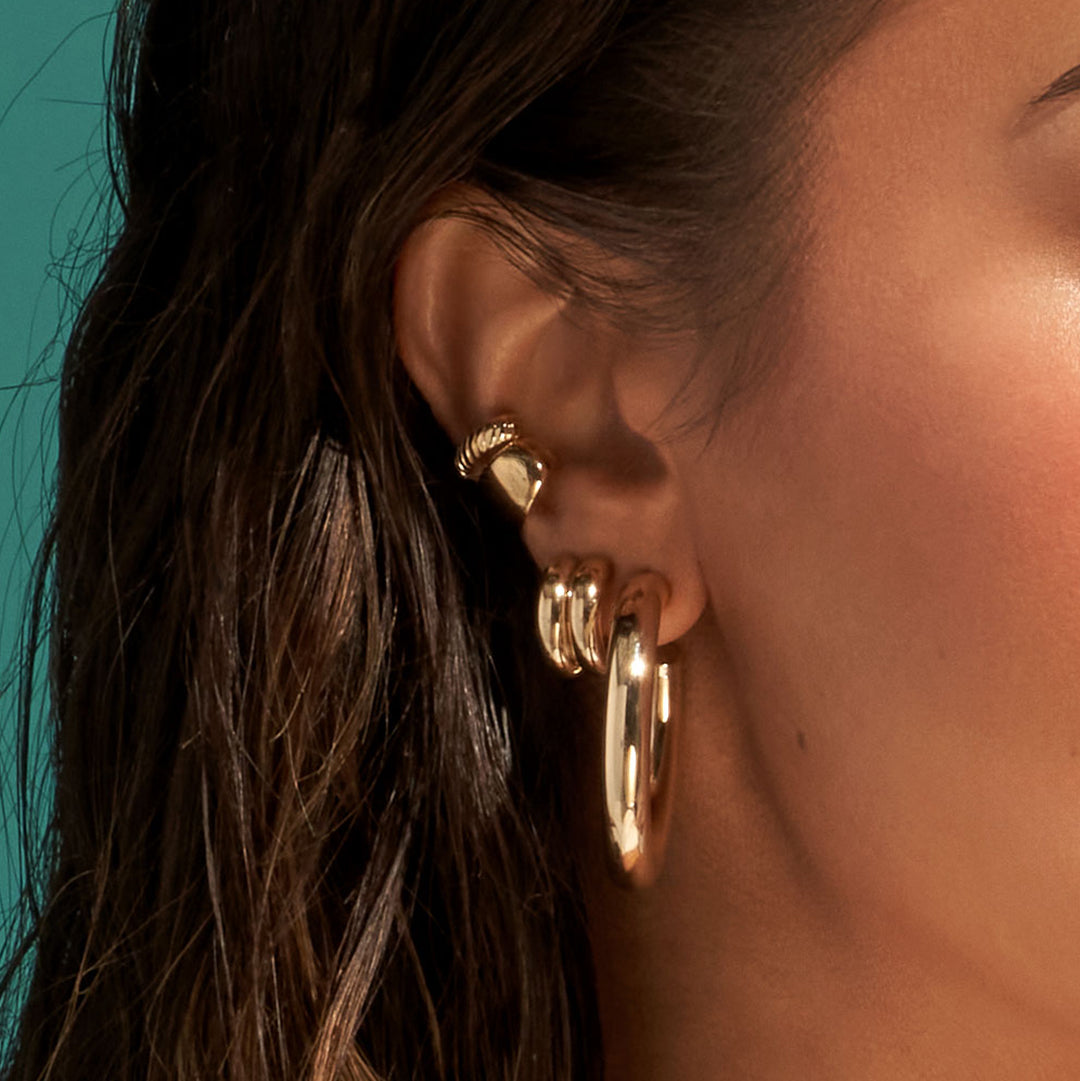 Close-up of Midas Chain Ava Wide Earring Cuff featuring intricate design and polished finish.