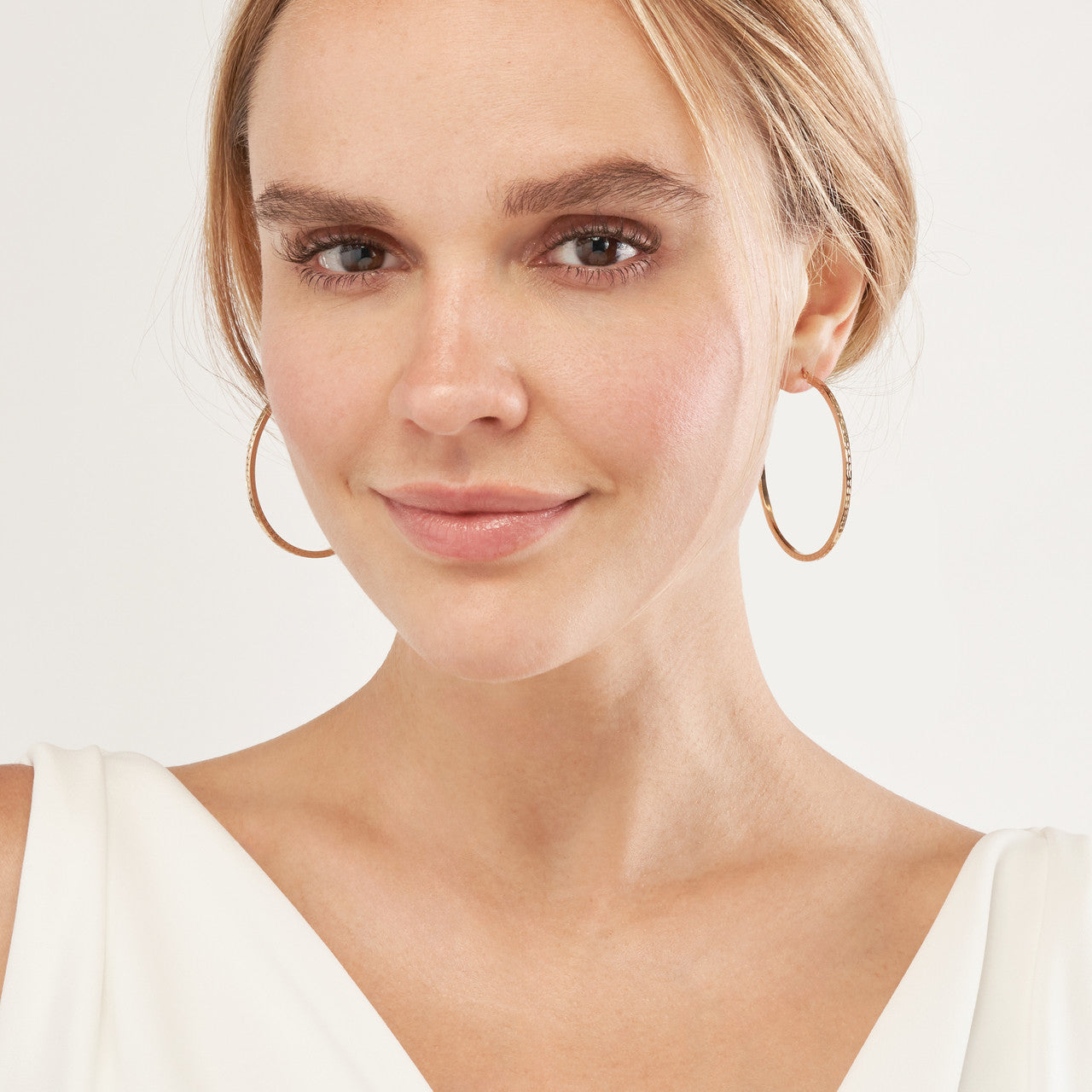 Simple 50mm square textured hoop earrings by My Store, showcasing a unique design and elegant finish.