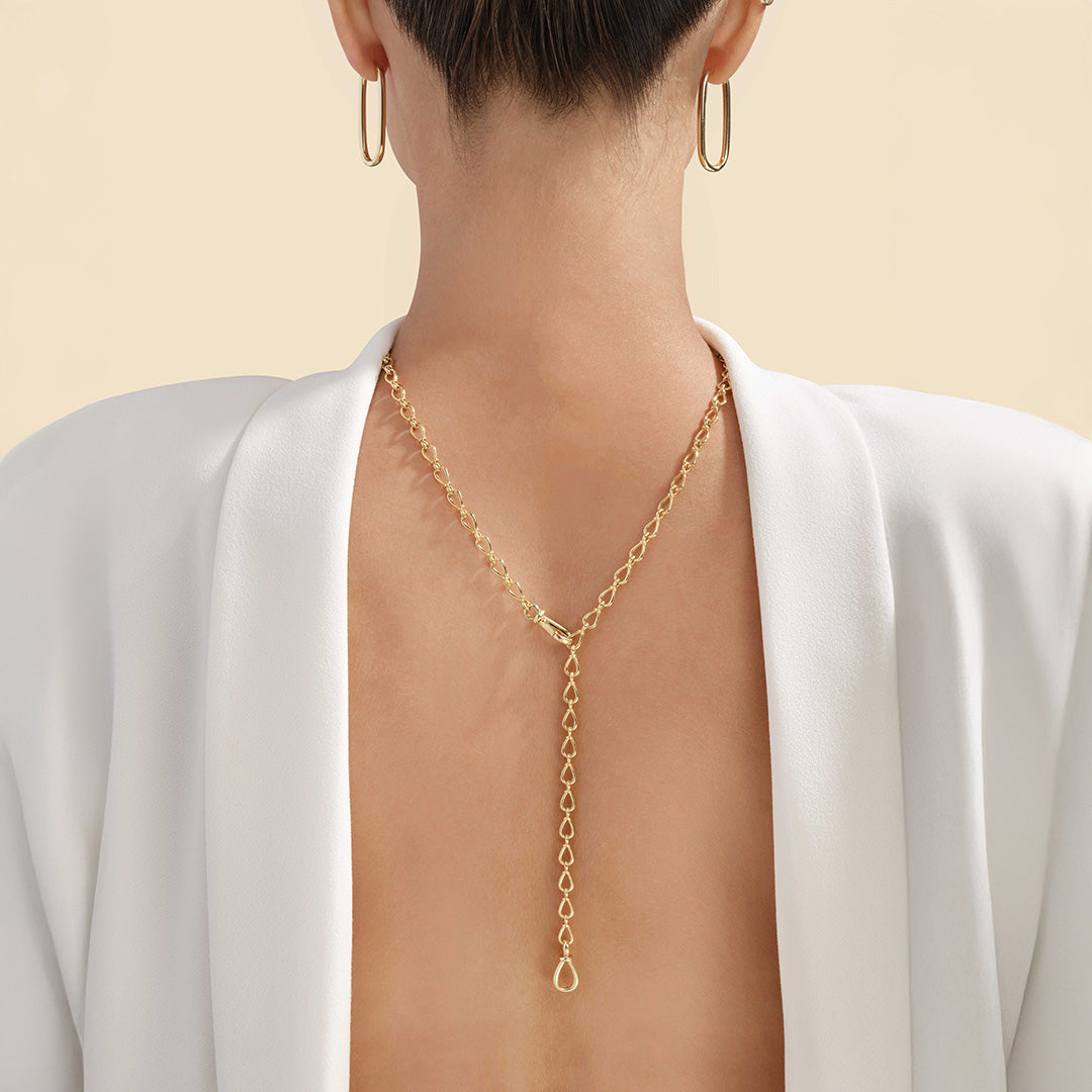 Simple teardrop link lariat necklace by VIA Jewelers, featuring a delicate design with elegant metal finish.