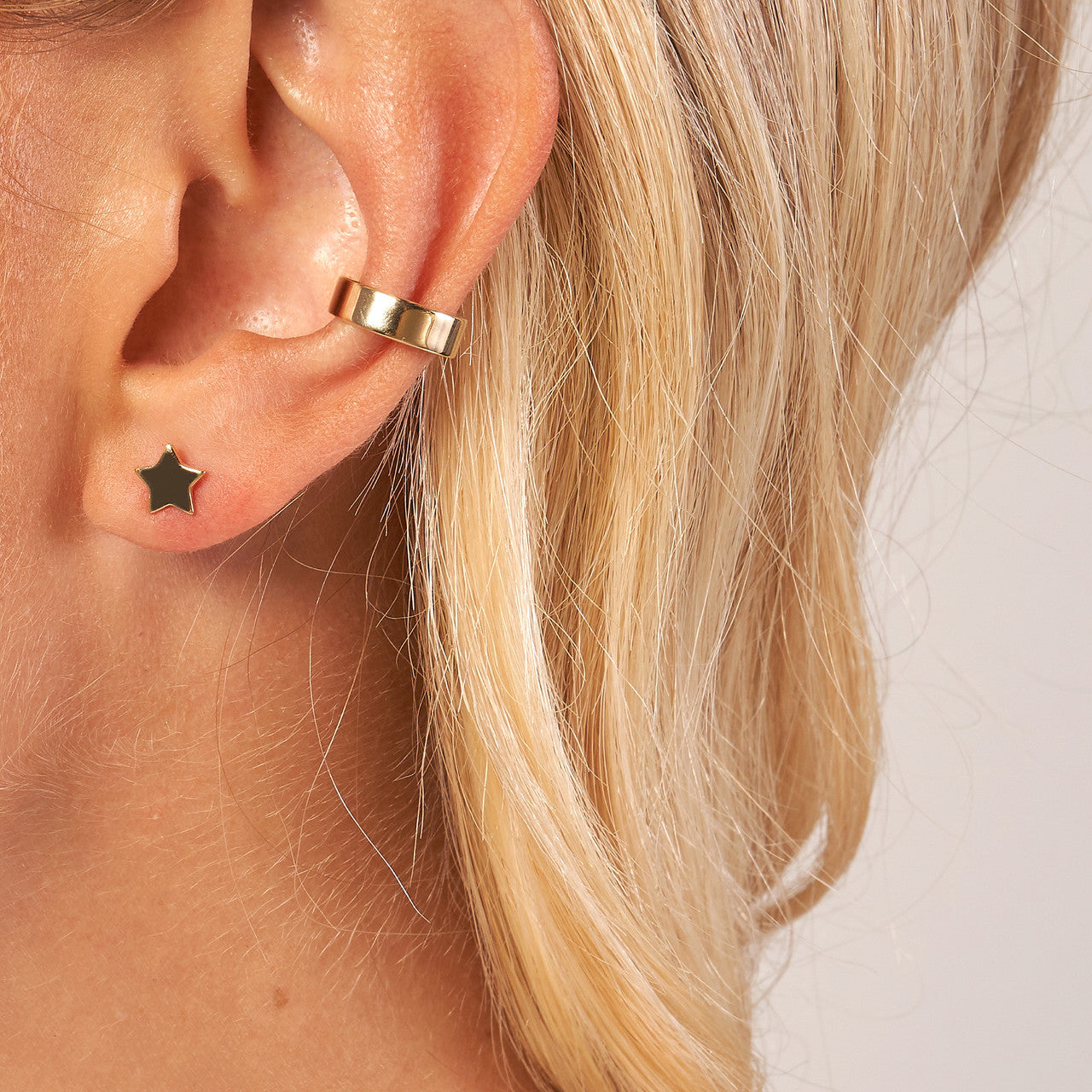 Simple star stud earrings by My Store featuring a classic design in polished silver finish.