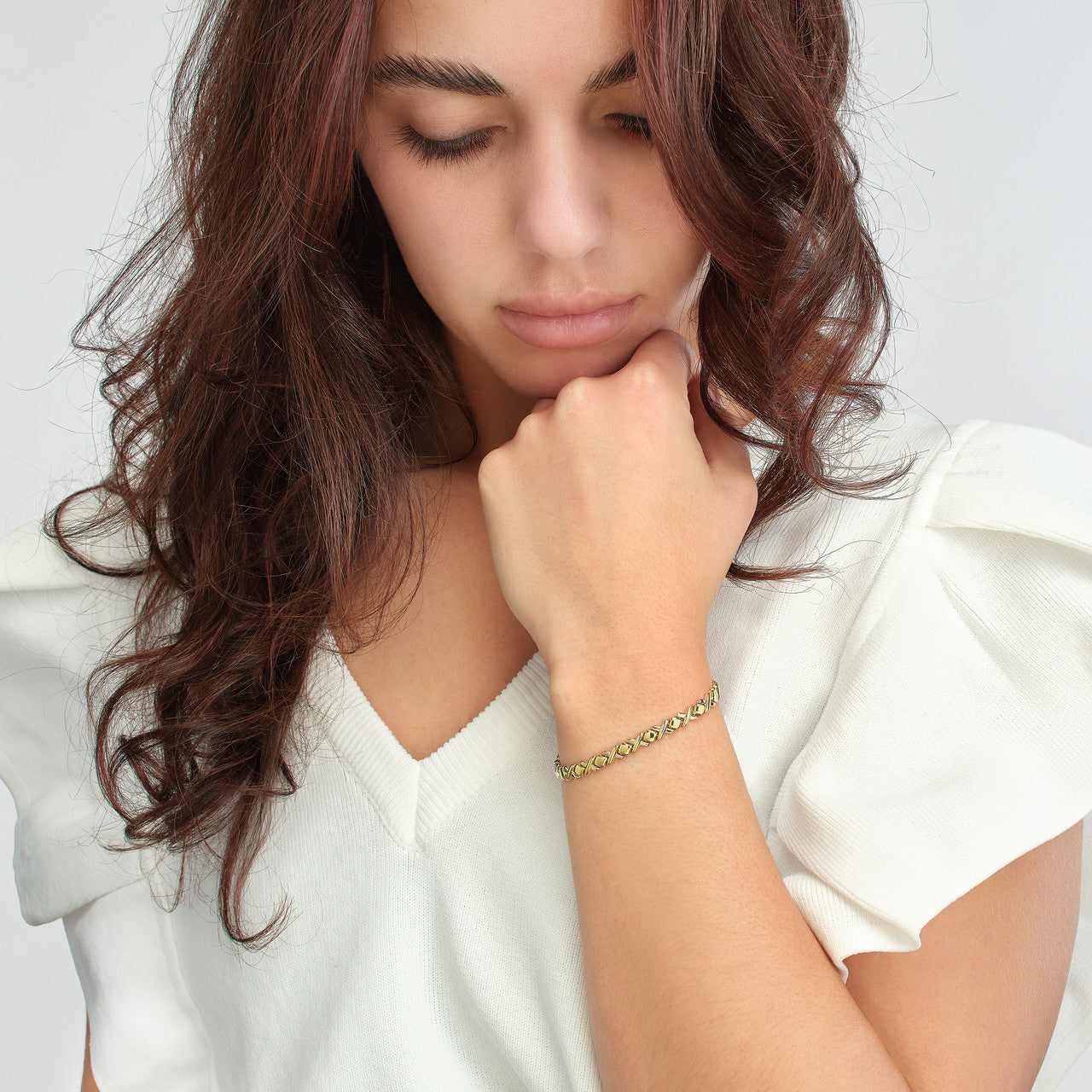 Simple XO bracelet by My Store, featuring a sleek design with interlocking letters in polished metal.